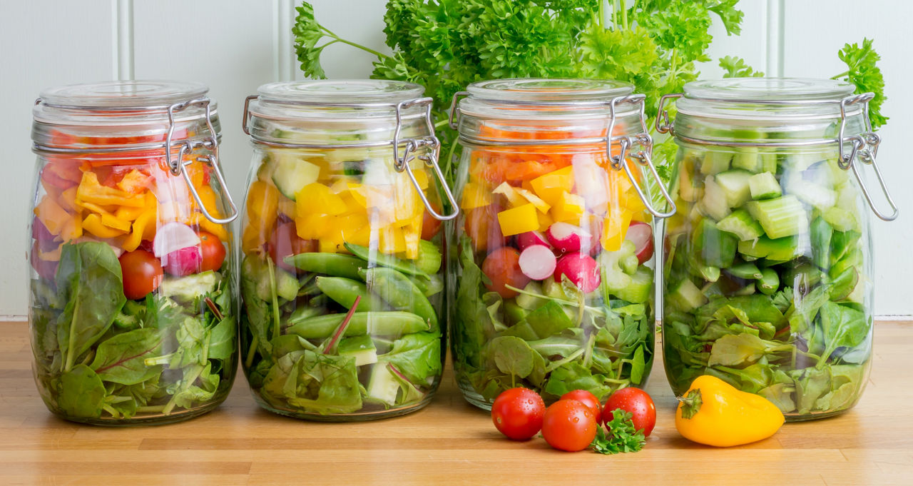 Vegetables in glass containers